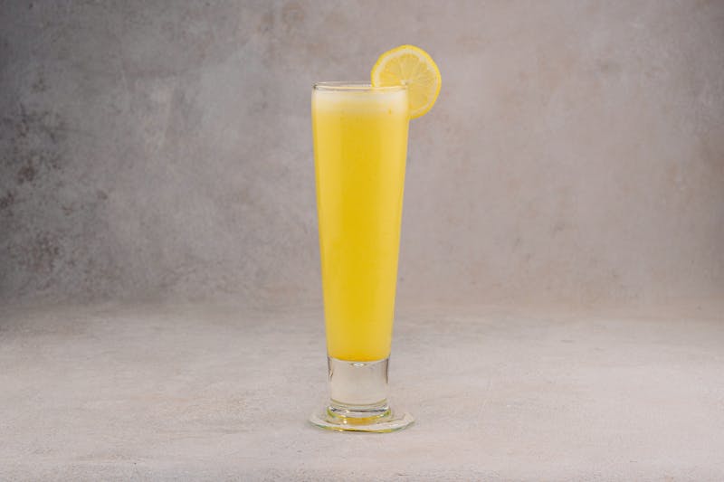 Fresh lemonade in a tall glass